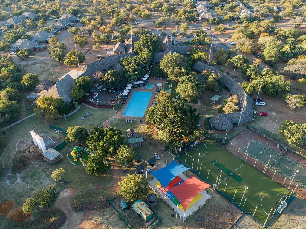 an aerial view of a park with a playground at Dikhololo in Brits