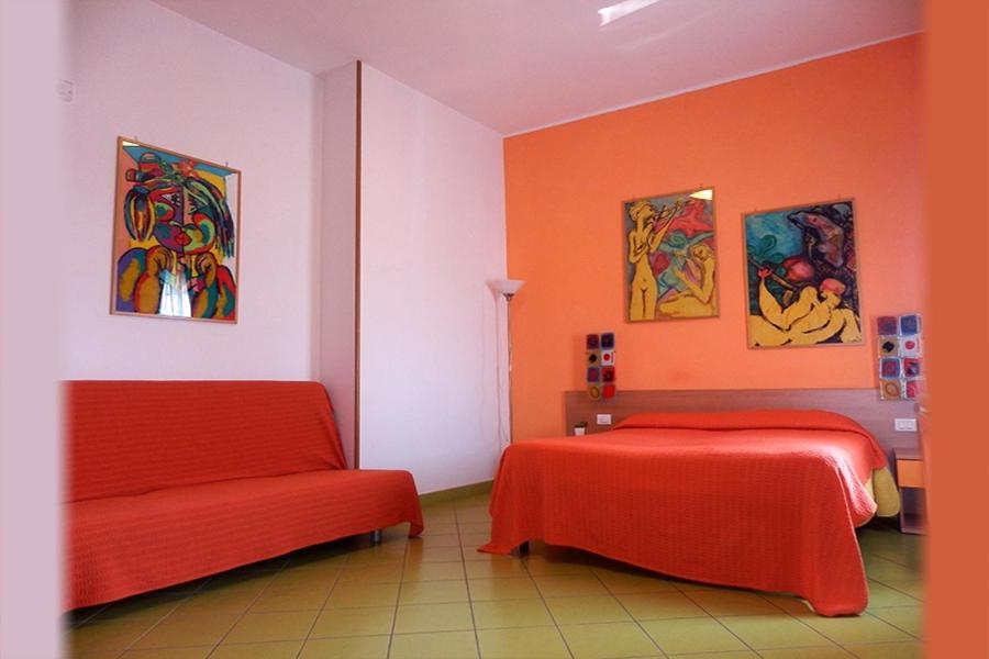 Postel nebo postele na pokoji v ubytování Alta Marea Sorrento