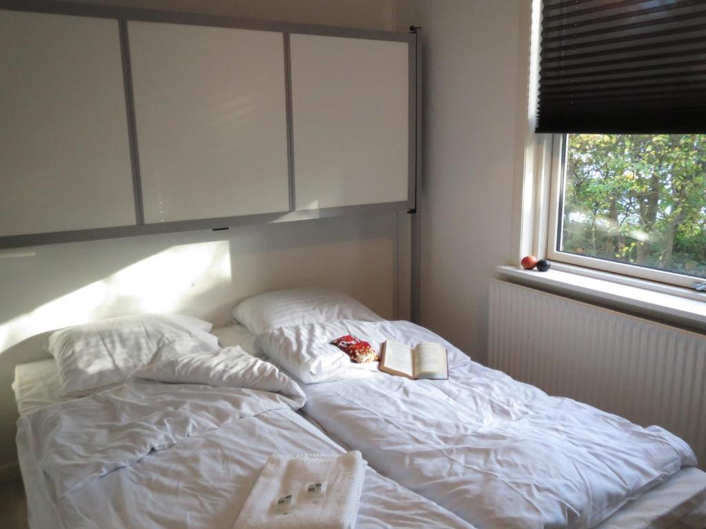 Postel nebo postele na pokoji v ubytování Danhostel Rebild