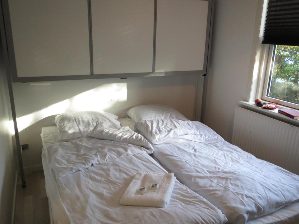 Postel nebo postele na pokoji v ubytování Danhostel Rebild