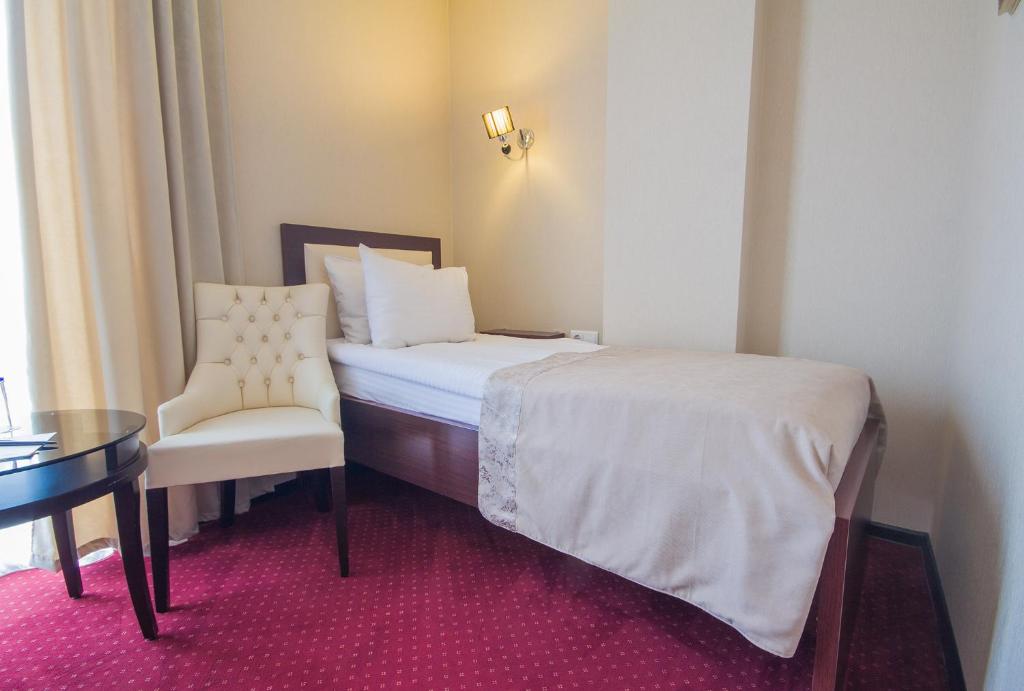 Voodi või voodid majutusasutuse Marionn Hotel toas