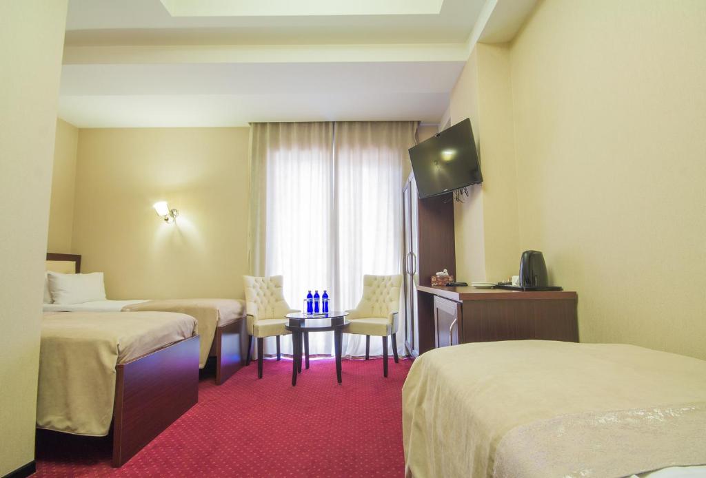 Voodi või voodid majutusasutuse Marionn Hotel toas