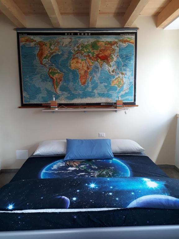 Postel nebo postele na pokoji v ubytování Foresteria B&B Vecchiascuola Pianazzola