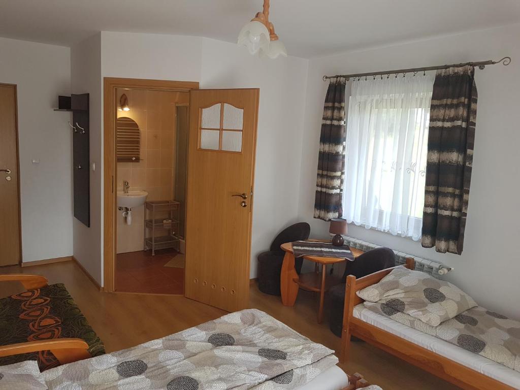 Posteľ alebo postele v izbe v ubytovaní Pokoje Pod Kopiencem Grzegorz Plata