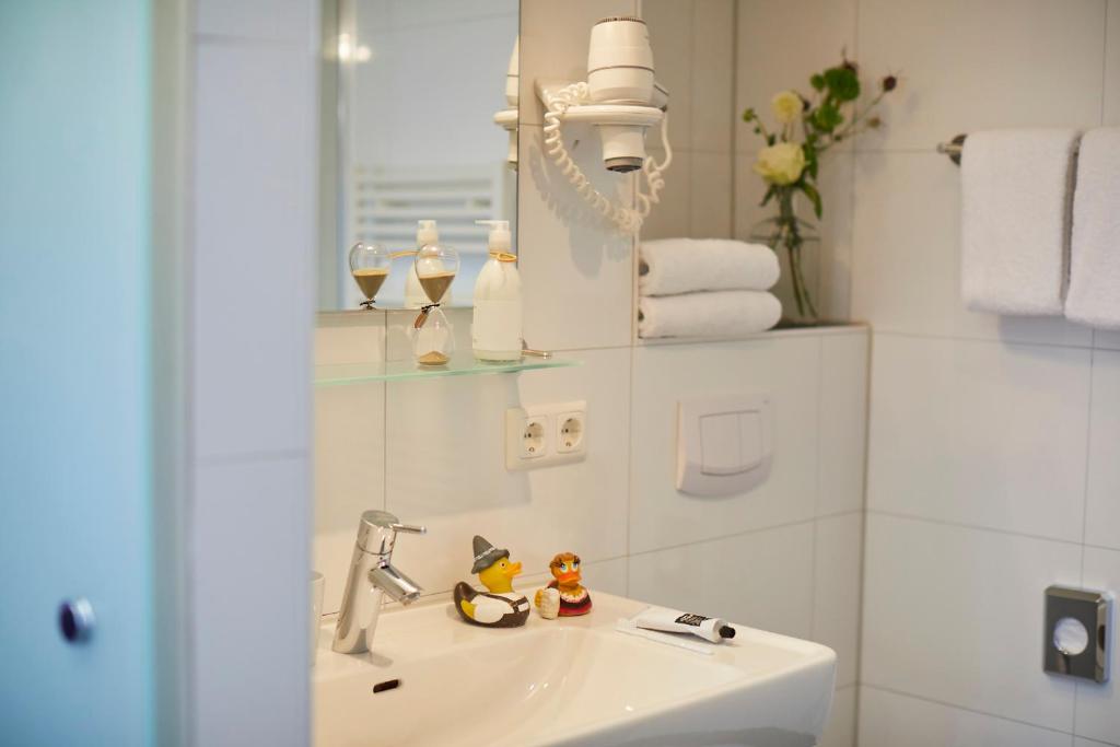 Koupelna v ubytování Hotel Mirabell by Maier Privathotels