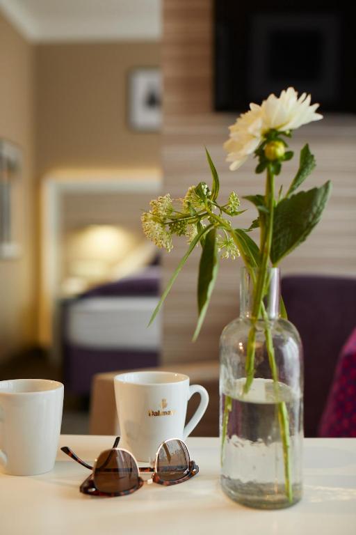 Postel nebo postele na pokoji v ubytování Hotel Mirabell by Maier Privathotels