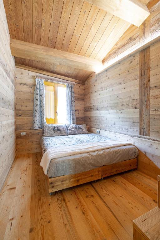 Postel nebo postele na pokoji v ubytování Amelu'