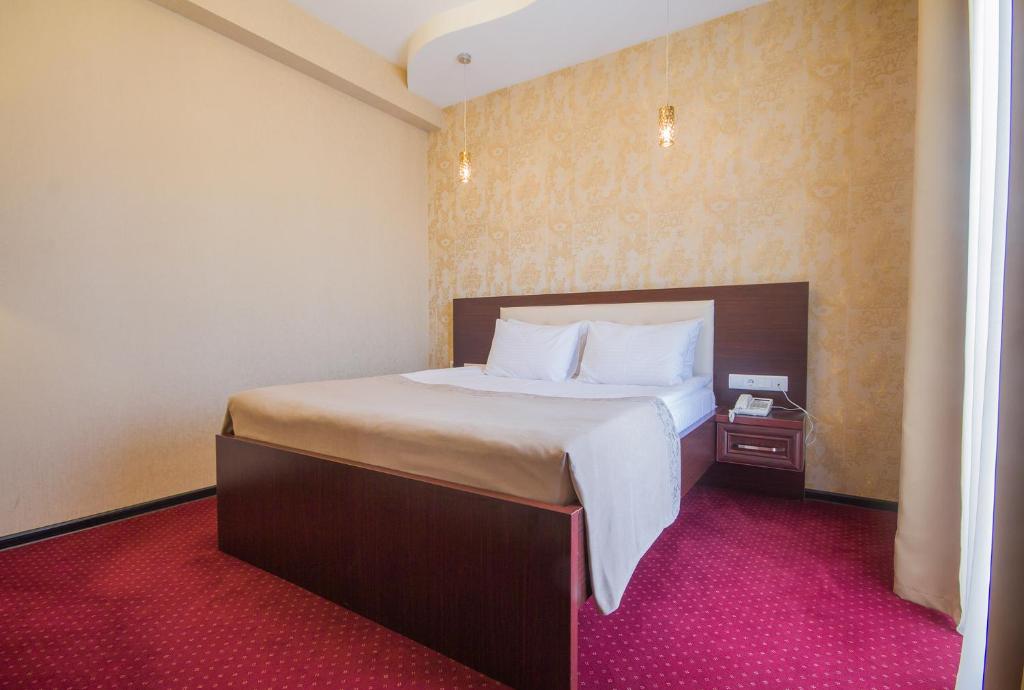 Voodi või voodid majutusasutuse Marionn Hotel toas