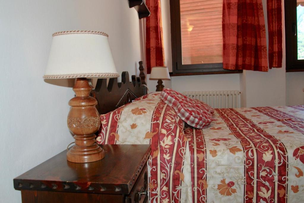 Postel nebo postele na pokoji v ubytování CasAda