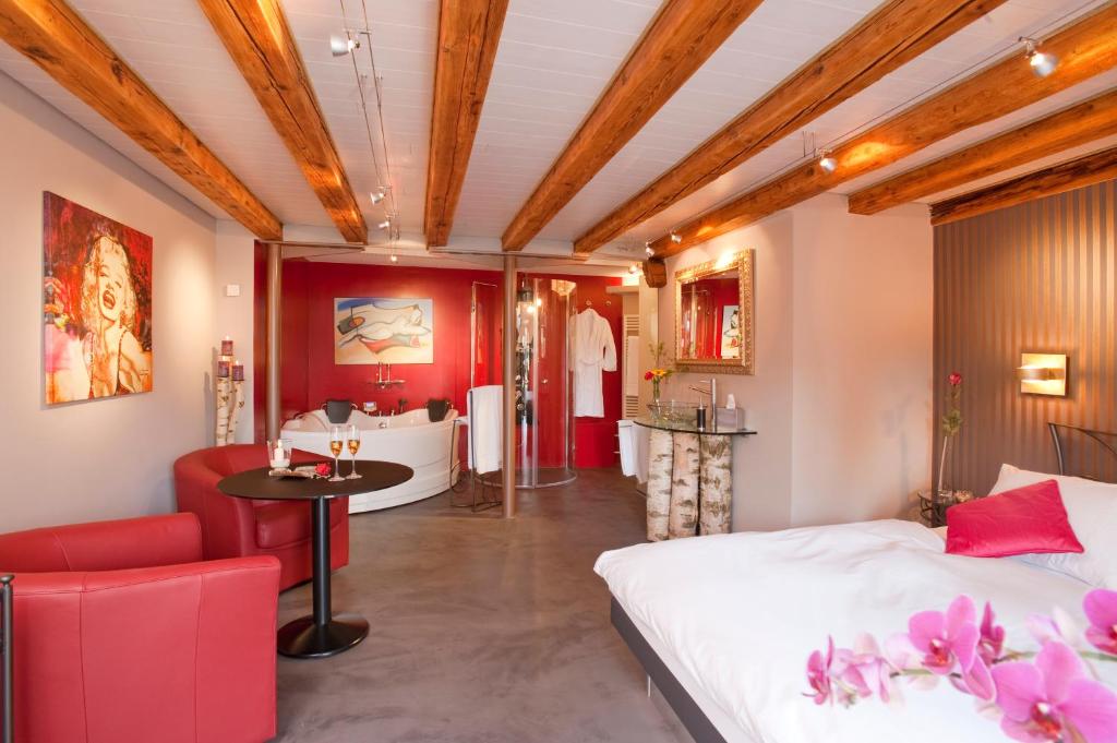 Postel nebo postele na pokoji v ubytování Hotel Landgasthof Hirschen