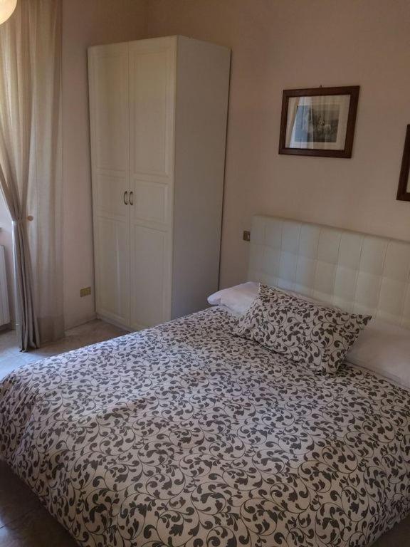 Postel nebo postele na pokoji v ubytování Borgo Antico Santa Lucia