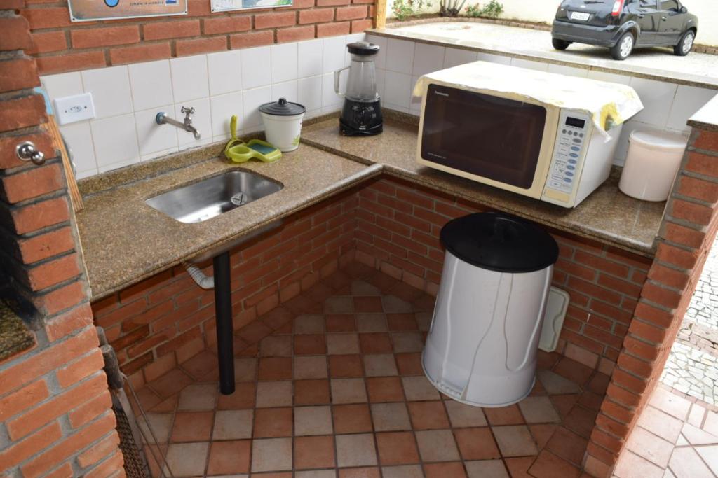 Kuchyň nebo kuchyňský kout v ubytování Residencial Doce Marina