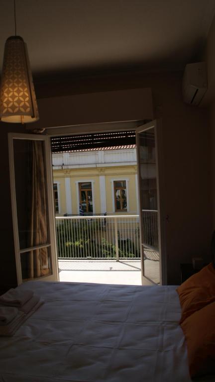 Posteľ alebo postele v izbe v ubytovaní The Victoria Square Exceptional Apartments
