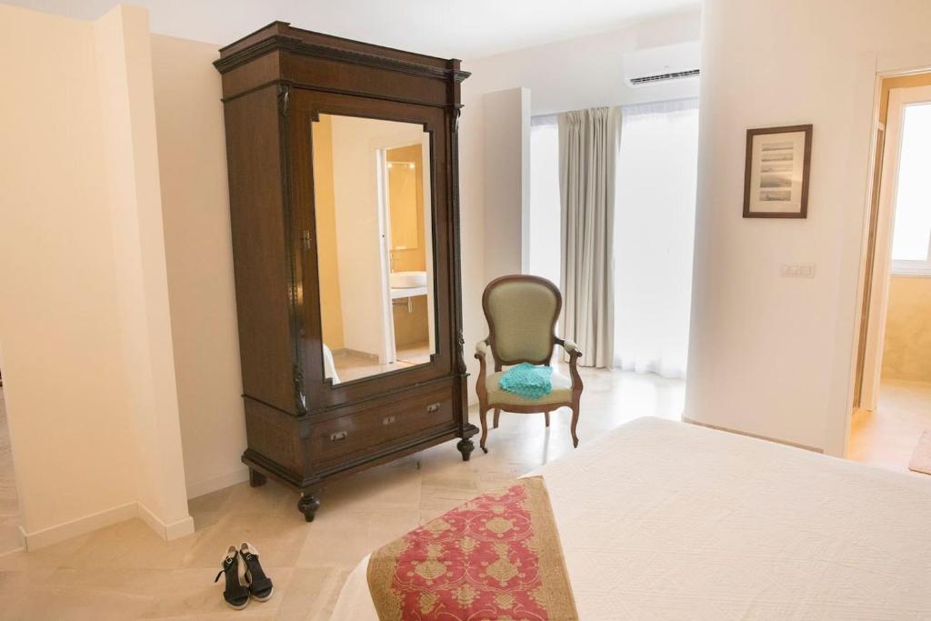 Posteľ alebo postele v izbe v ubytovaní Residenza Lago