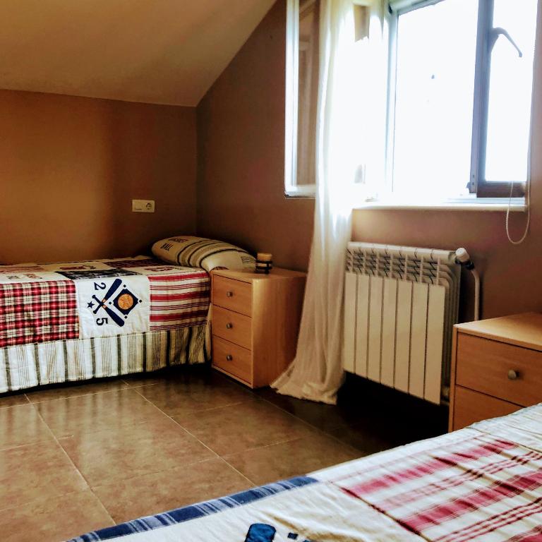 Postel nebo postele na pokoji v ubytování La Barranca