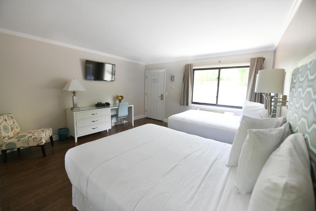 Postel nebo postele na pokoji v ubytování Bayview Resort