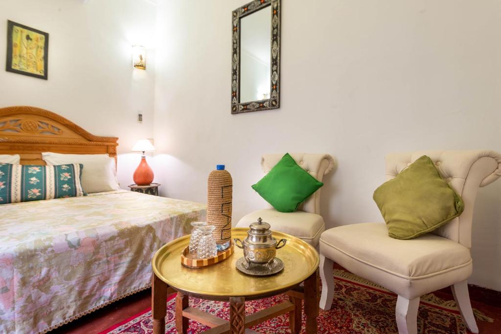 Postel nebo postele na pokoji v ubytování Riad Belko