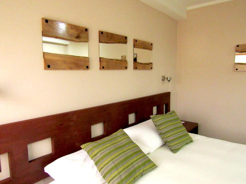 Cama o camas de una habitación en Hotel Pucón Indómito