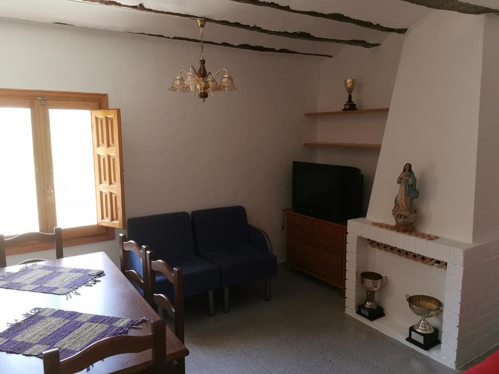 TV a/nebo společenská místnost v ubytování Casa Rural y Albergue Tormon