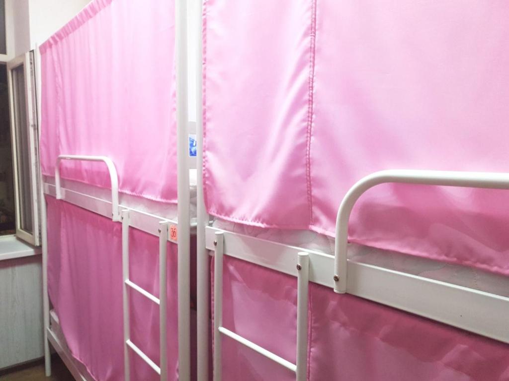 Postel nebo postele na pokoji v ubytování Hostel 777 Vokzal