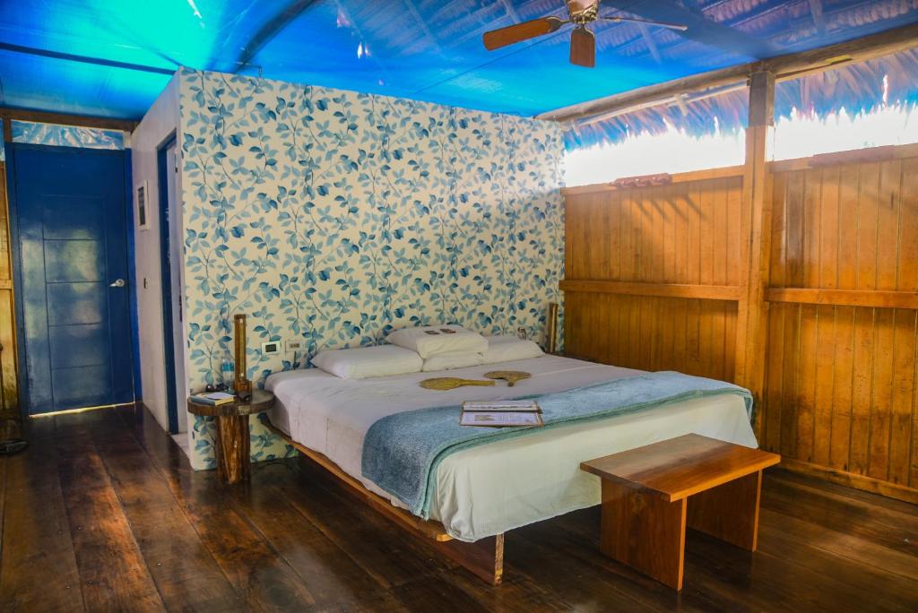 Postel nebo postele na pokoji v ubytování Amazon Muyuna Lodge - All Inclusive
