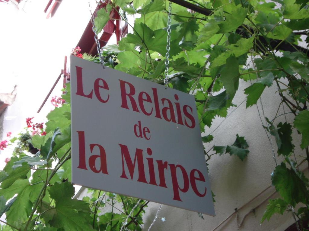 Una señal que dice le radials do la mine en Le Relais de La Myrpe, en Bergerac