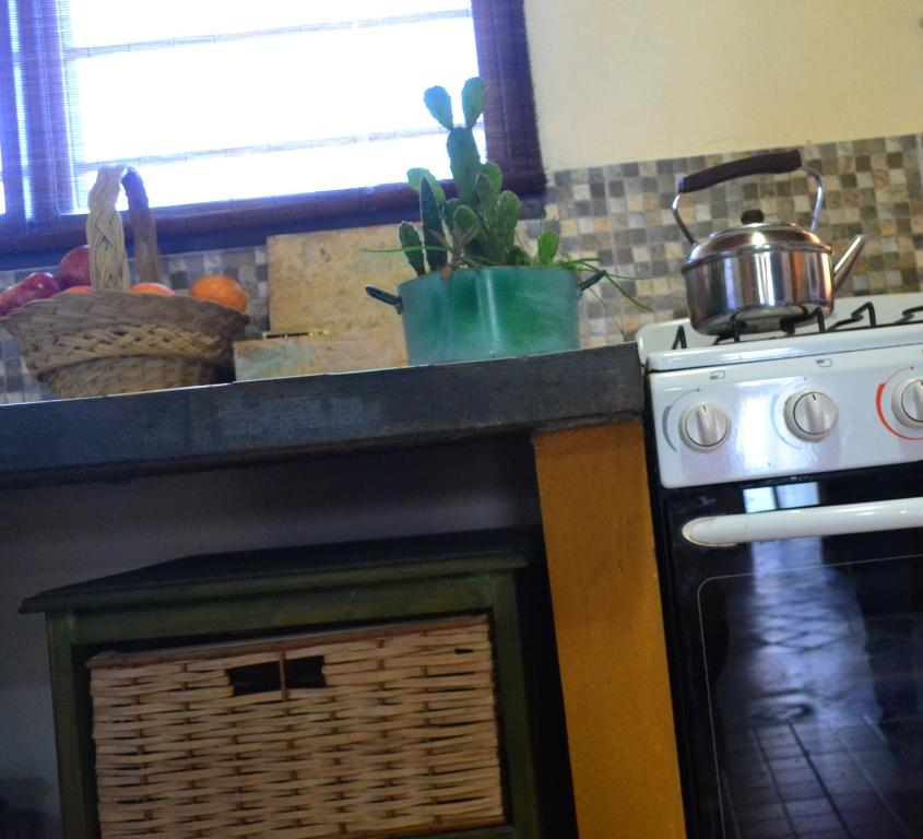 Una cocina o kitchenette en Yataí Casas