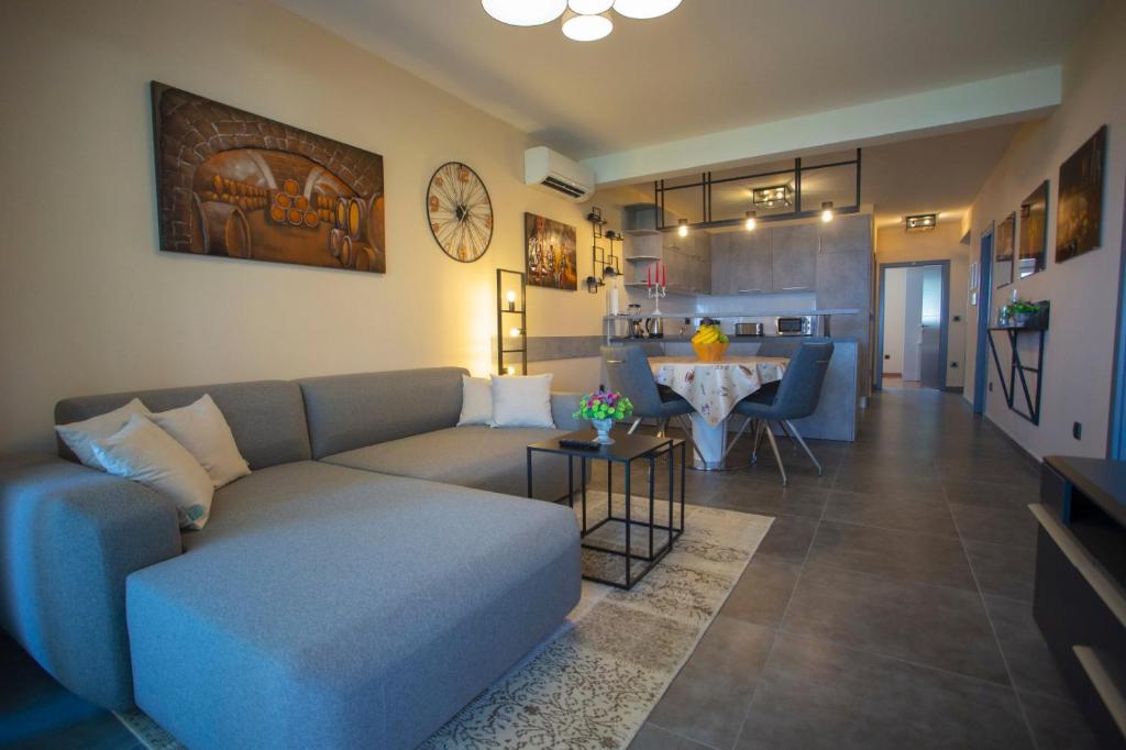 a living room with a couch and a table at Apartment Edgar in Makarska
