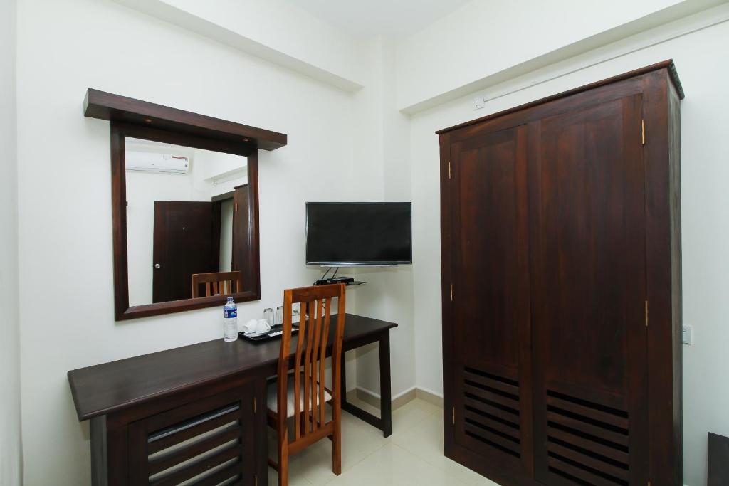 TV a/nebo společenská místnost v ubytování Hotel Nelly Marine
