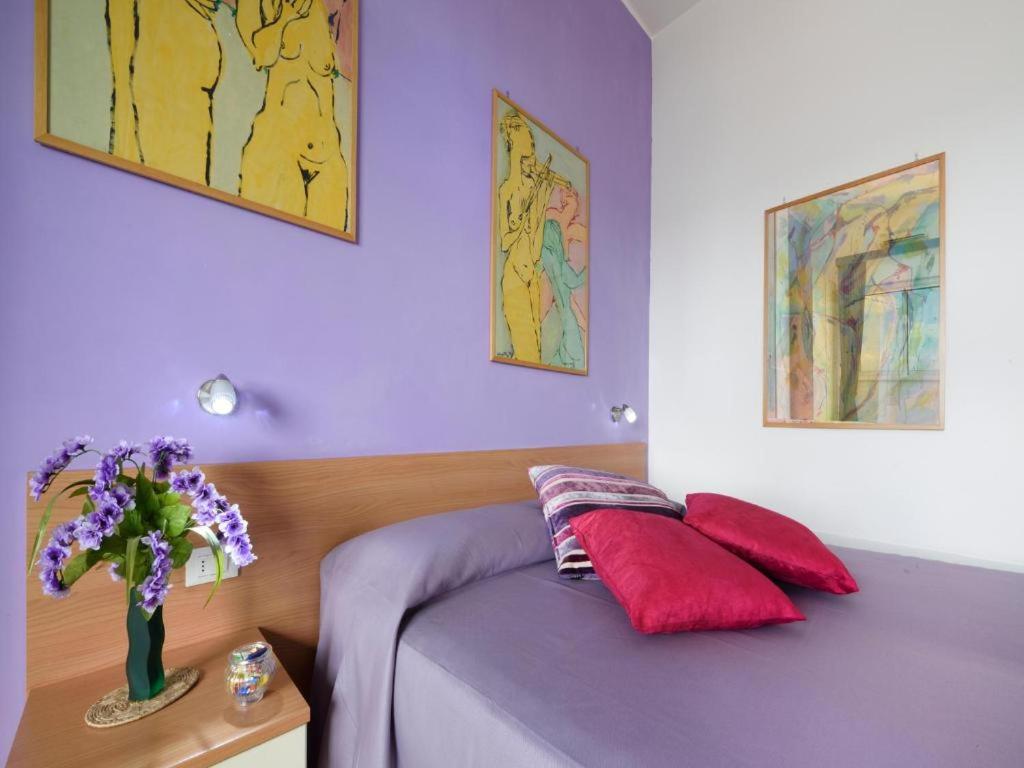 Postel nebo postele na pokoji v ubytování Alta Marea Sorrento