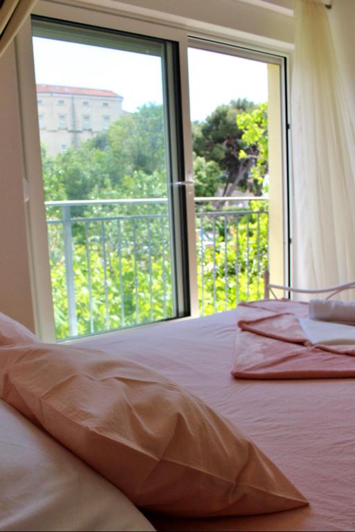 Postel nebo postele na pokoji v ubytování Rooms Marana