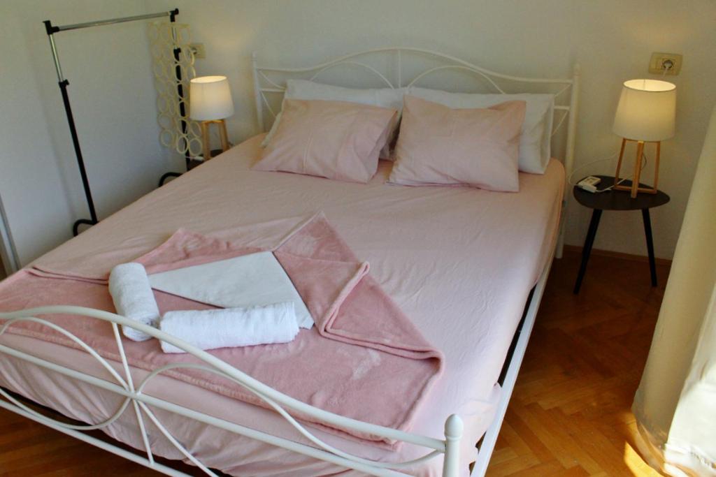 Postel nebo postele na pokoji v ubytování Rooms Marana