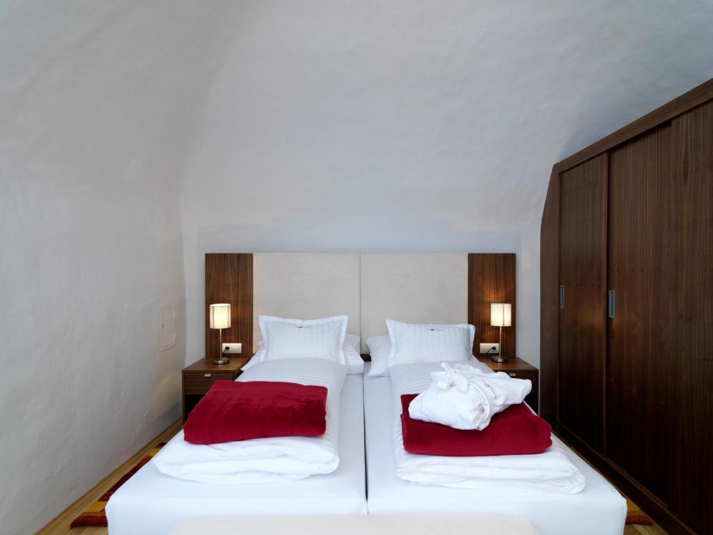 Postelja oz. postelje v sobi nastanitve Ferienappartements Oberstbergmeisteramt
