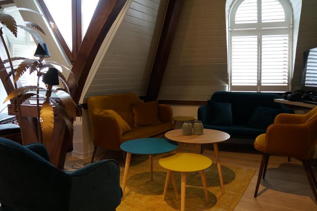 Posezení v ubytování Charming Suites Jan Zonder Vrees