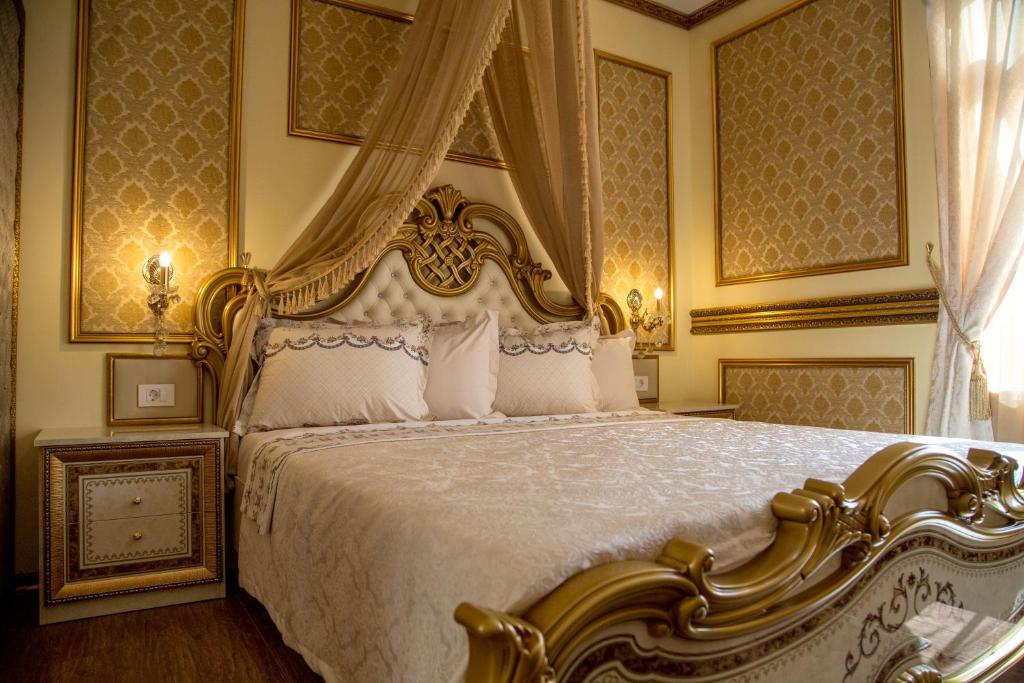 Postel nebo postele na pokoji v ubytování Robevski luxury rooms