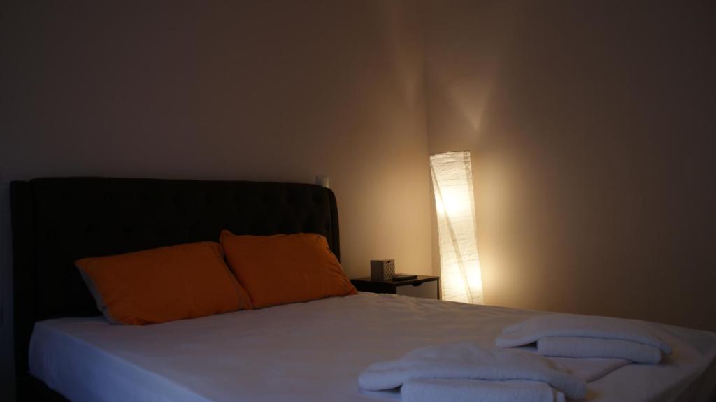Posteľ alebo postele v izbe v ubytovaní The Victoria Square Exceptional Apartments