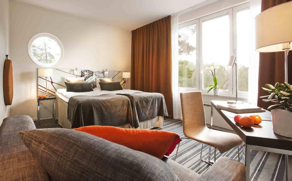 Postel nebo postele na pokoji v ubytování Bosön Hotell & Konferens