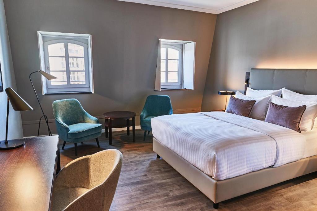 Postel nebo postele na pokoji v ubytování Steigenberger Hotel de Saxe