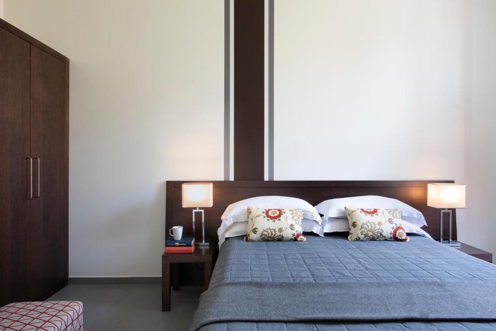 Postel nebo postele na pokoji v ubytování Residenza Termini