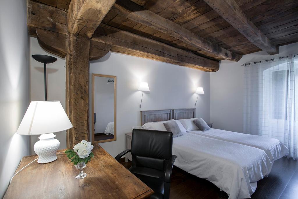 Postel nebo postele na pokoji v ubytování Casa Rural Enea