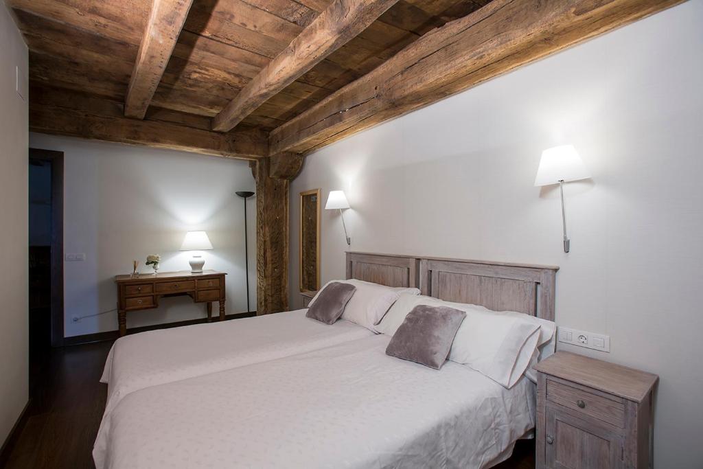 Postel nebo postele na pokoji v ubytování Casa Rural Enea