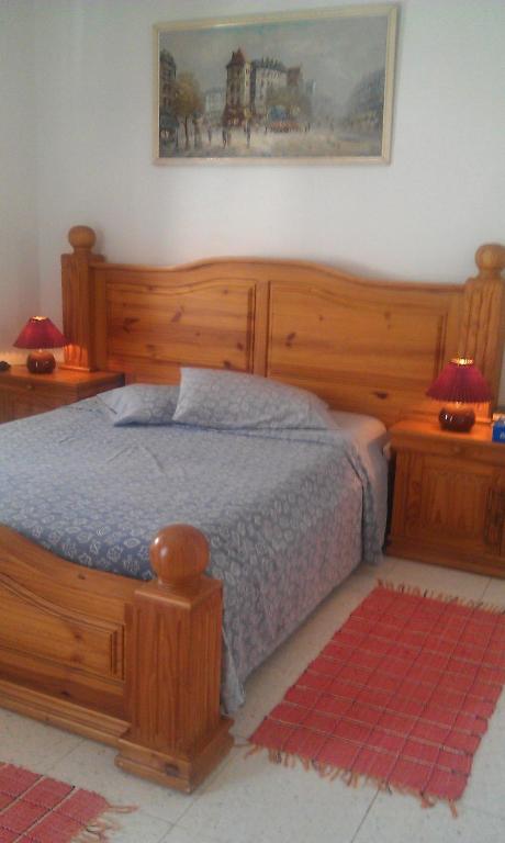Postel nebo postele na pokoji v ubytování Shared Top 1st floor villa