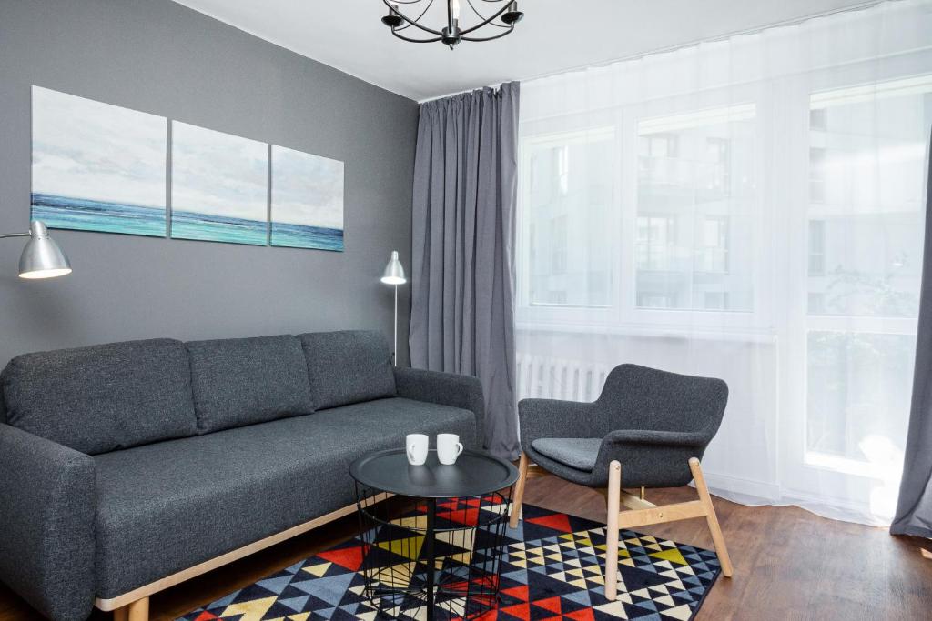 Posedenie v ubytovaní First Central Apartments by Noclegi Renters
