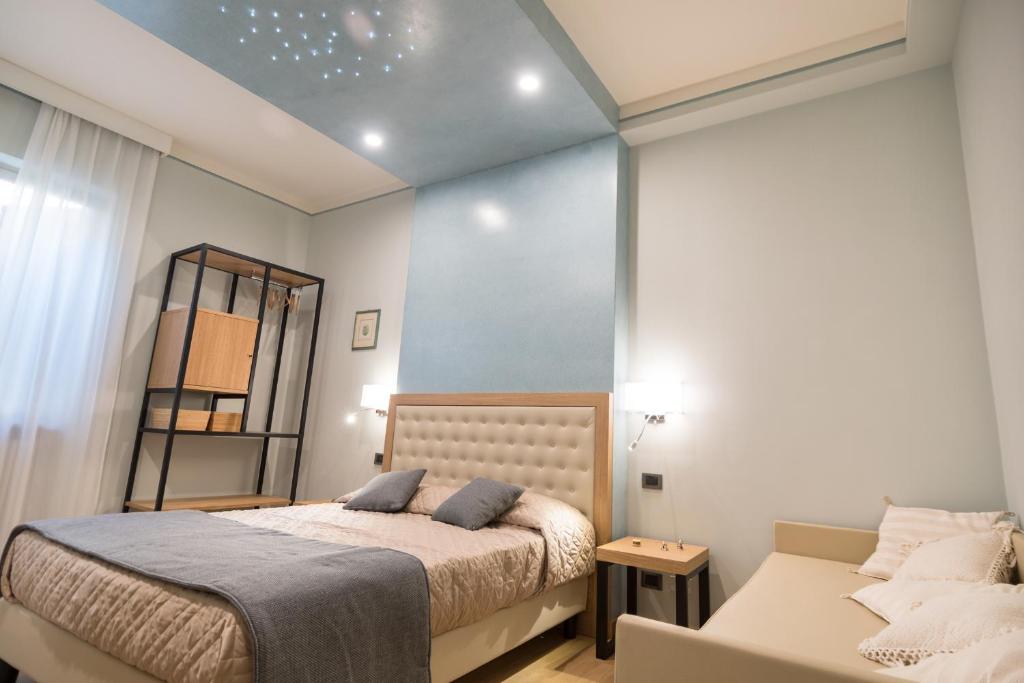 Postel nebo postele na pokoji v ubytování Brunelli B&B