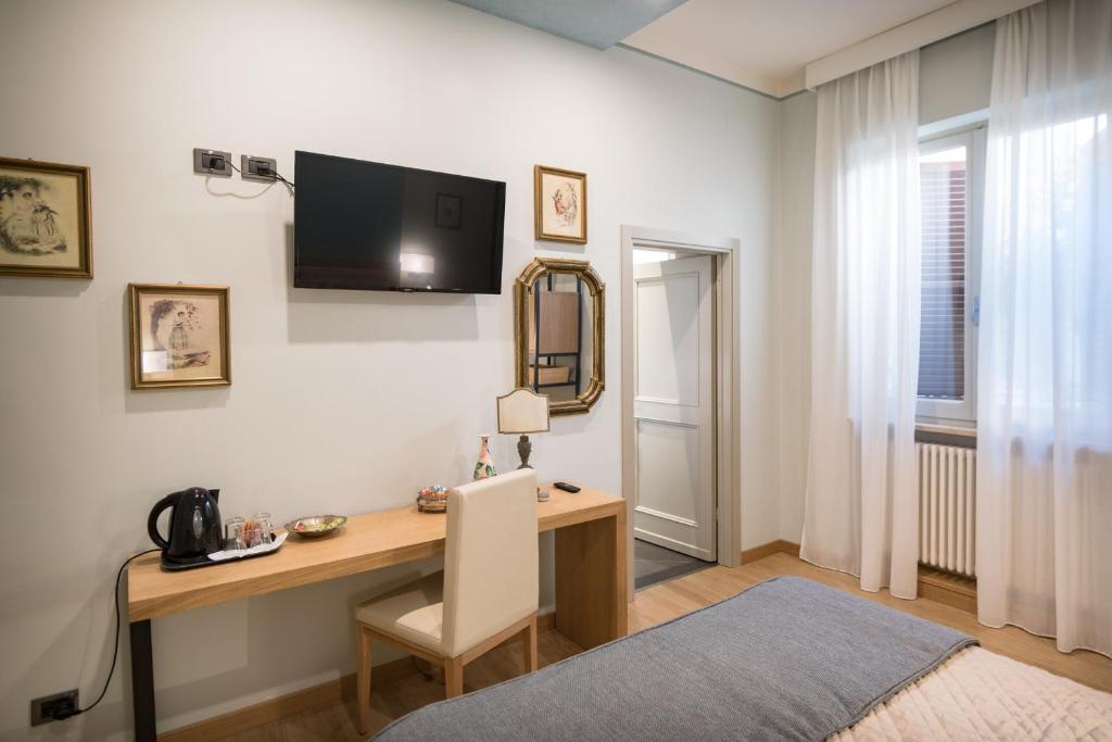 TV a/nebo společenská místnost v ubytování Brunelli B&B