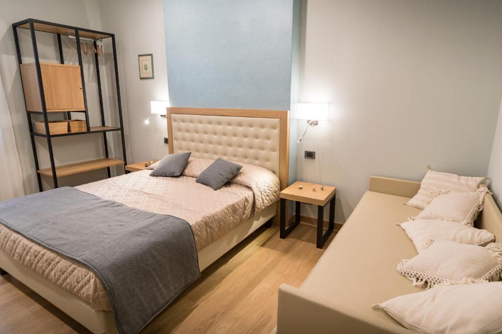Postel nebo postele na pokoji v ubytování Brunelli B&B