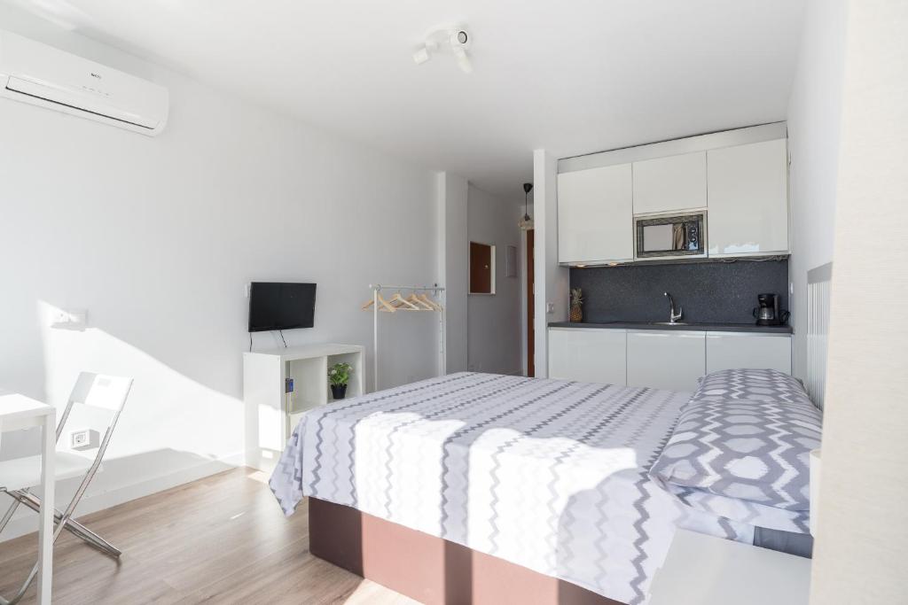 Posteľ alebo postele v izbe v ubytovaní LU&CIA CANDADO BEACH RELAX