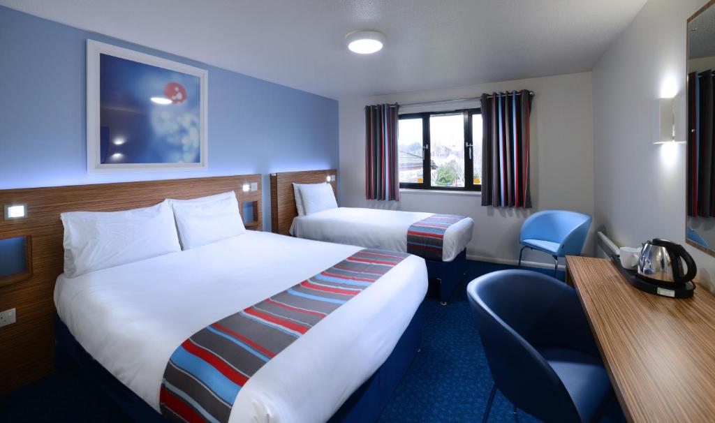 Letto o letti in una camera di Travelodge Dublin Airport North 'Swords'