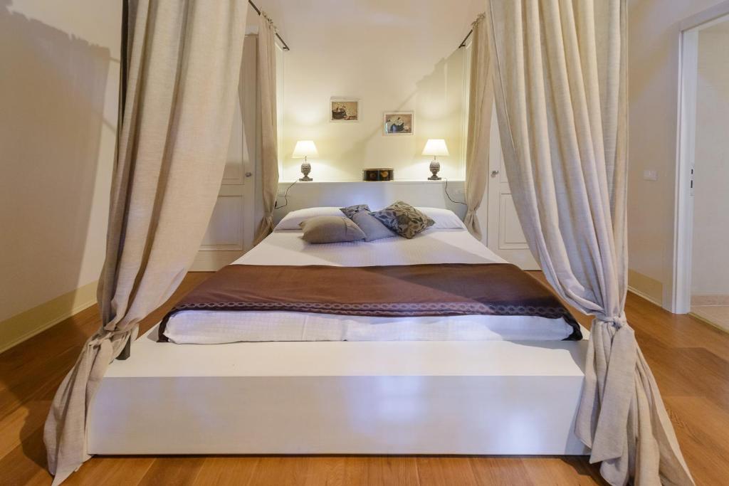 Postel nebo postele na pokoji v ubytování B&B Corte Jago