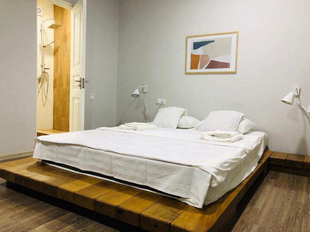 Llit o llits en una habitació de Winehouse